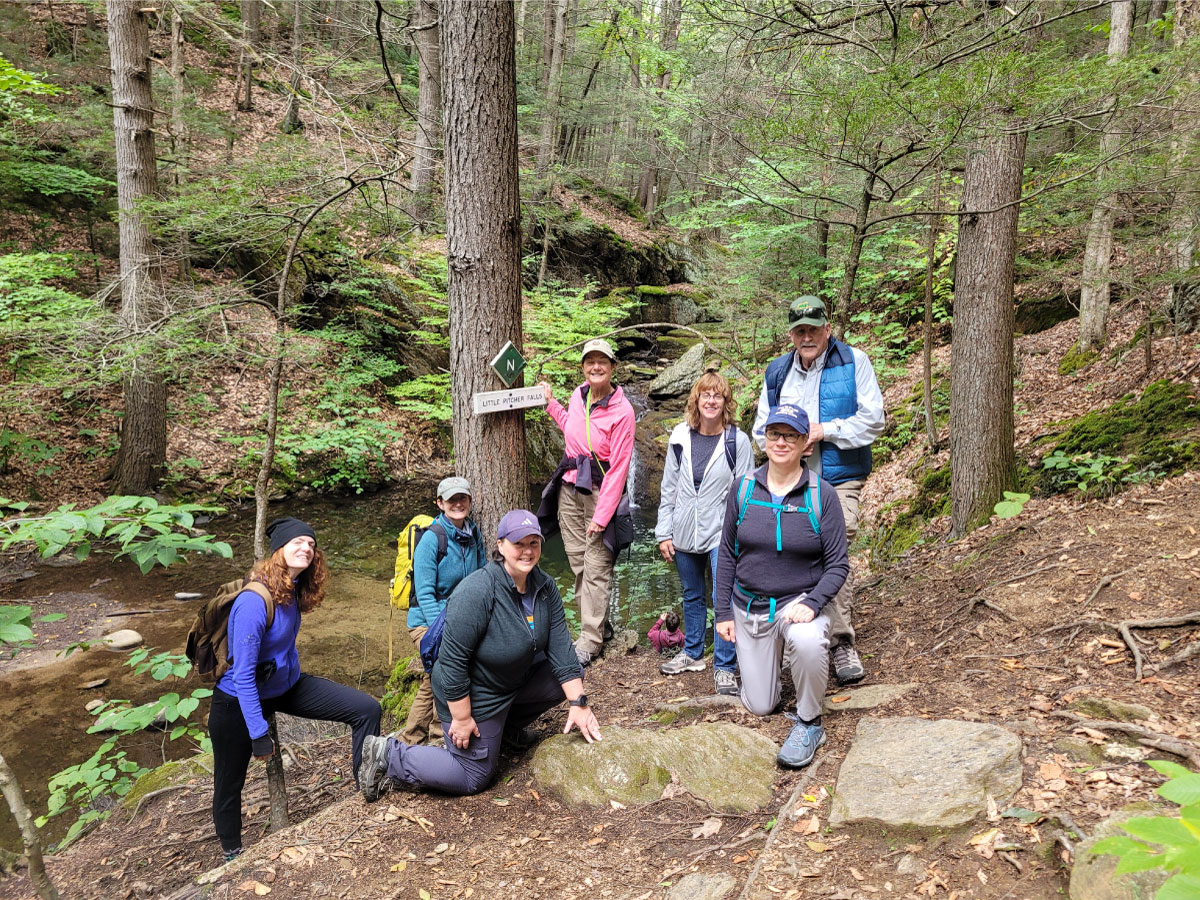 Hikers pose for a group shot