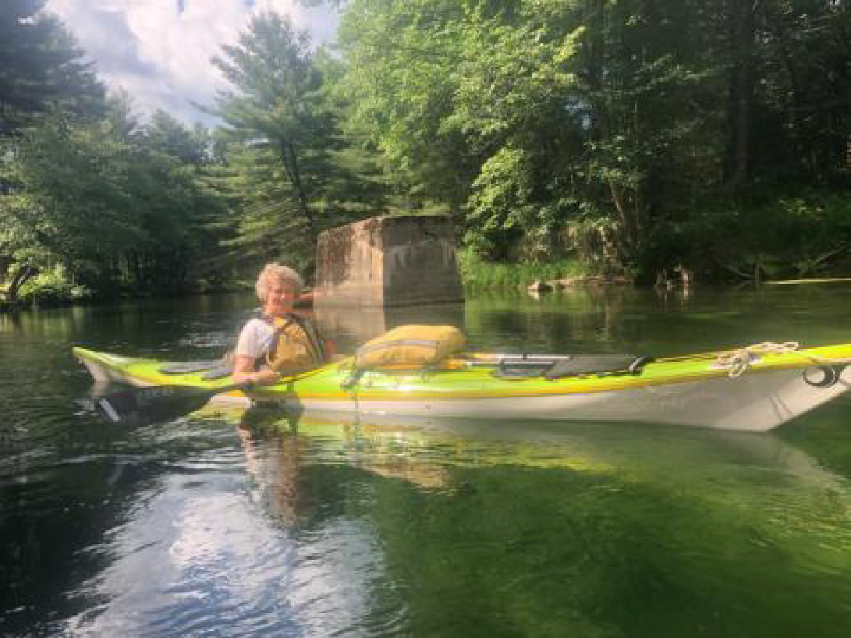 Woman paddling in a kayak