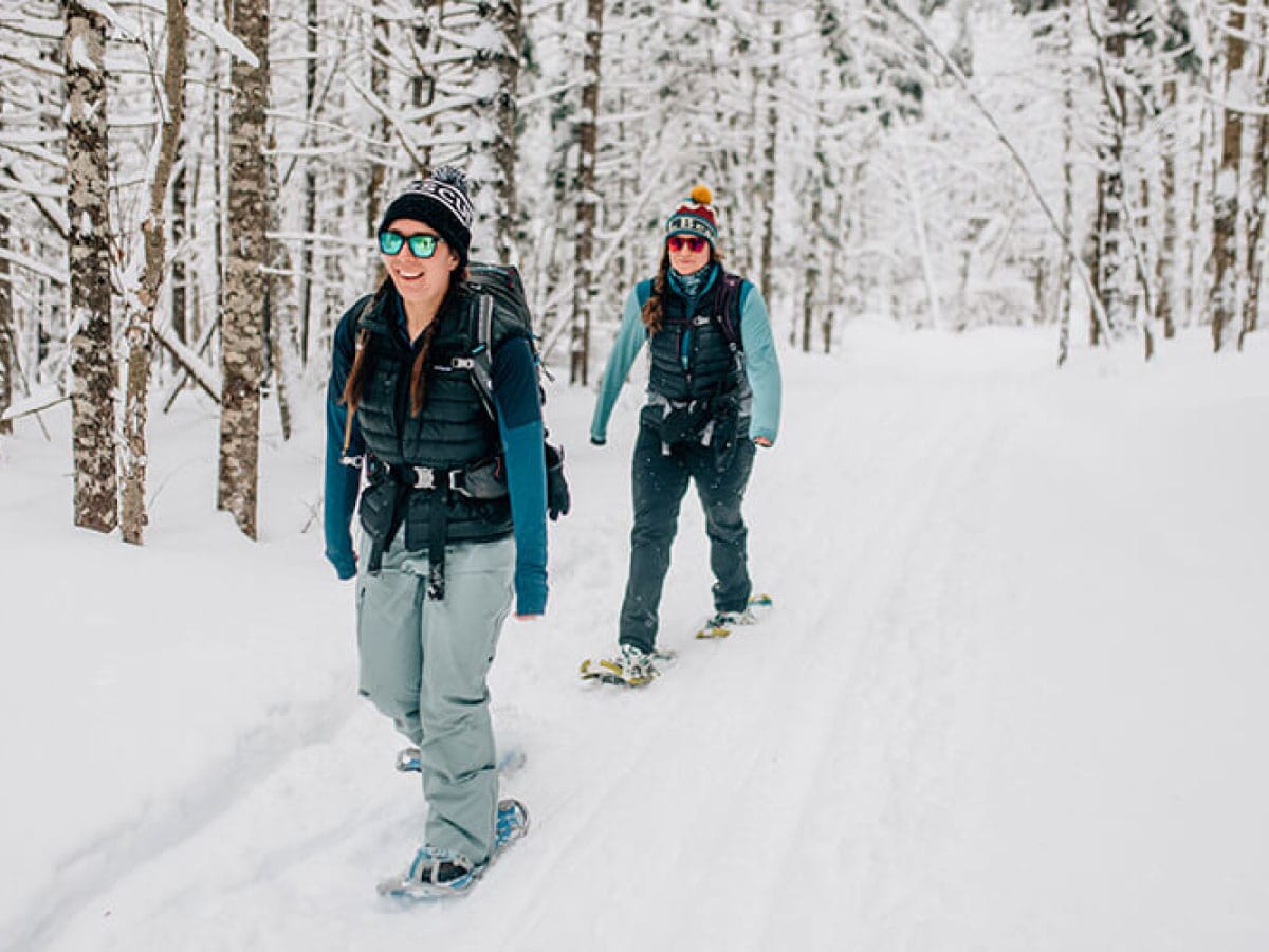 Two people snowshoeing