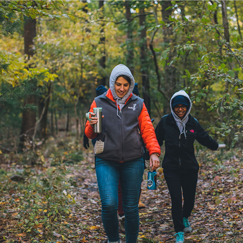 Two women hiking in the fall