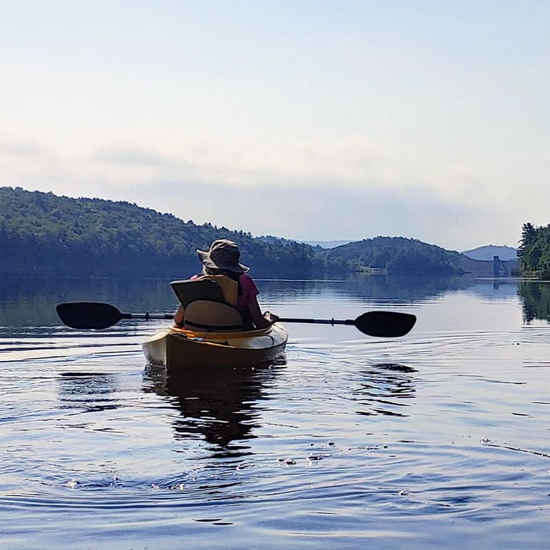 Canoeists on a quiet pond