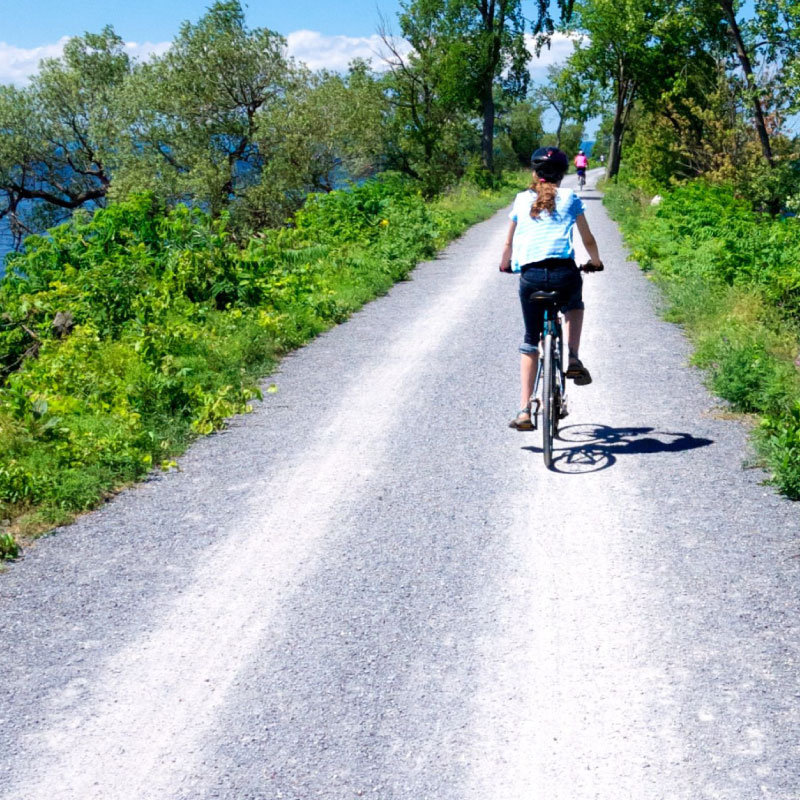 A cyclist crosses a causeway