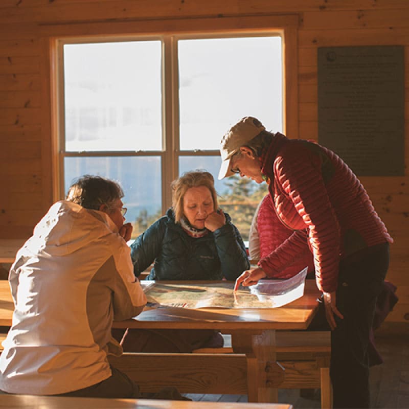Hikers looking at a map