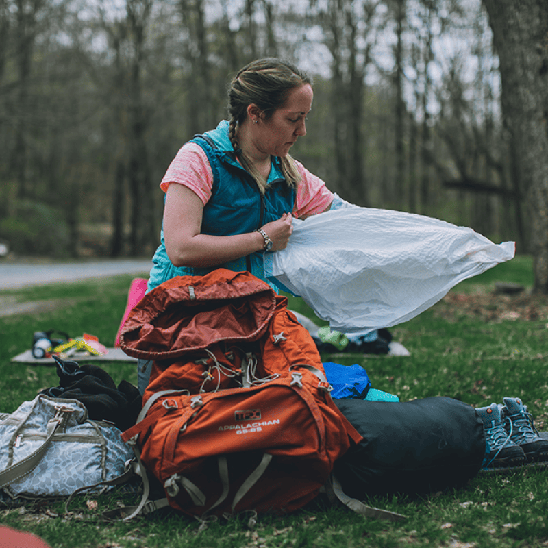 Woman packing gear