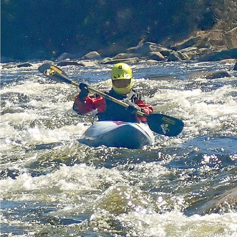 Kayaker in whitewater