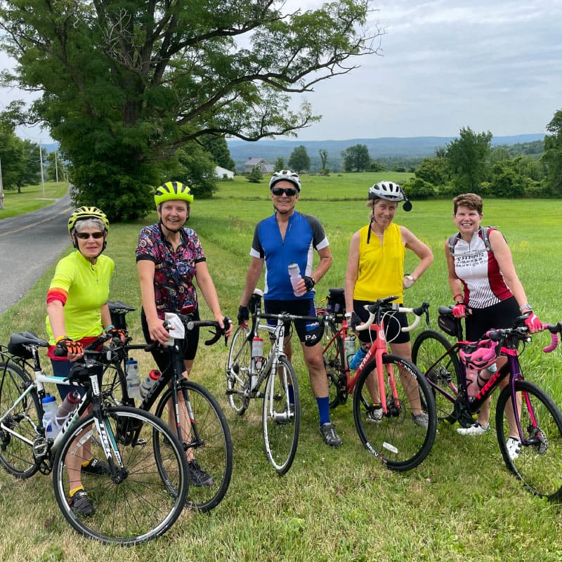 Cyclists pose for a group shot