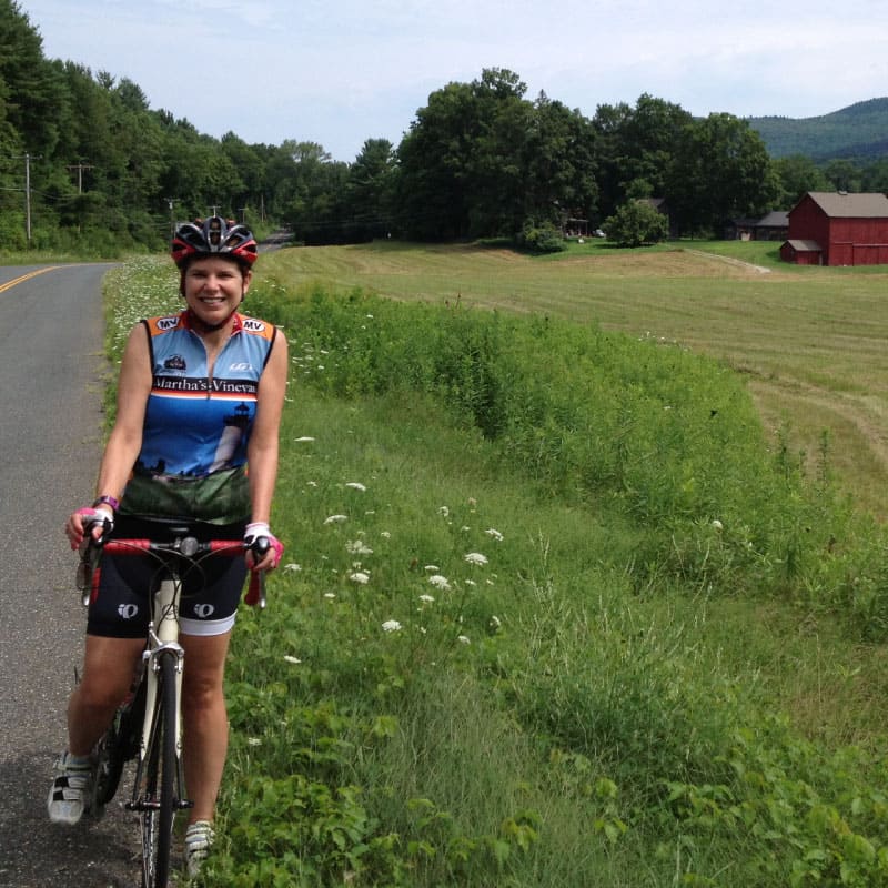 Cyclist by the side of the road