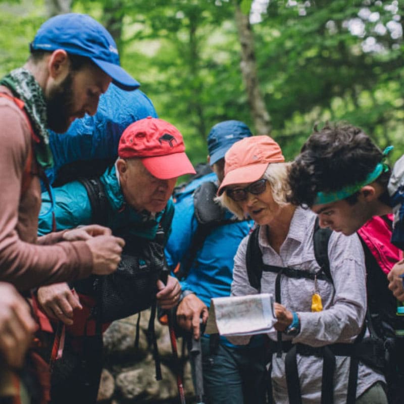 Hike leader explaining a map