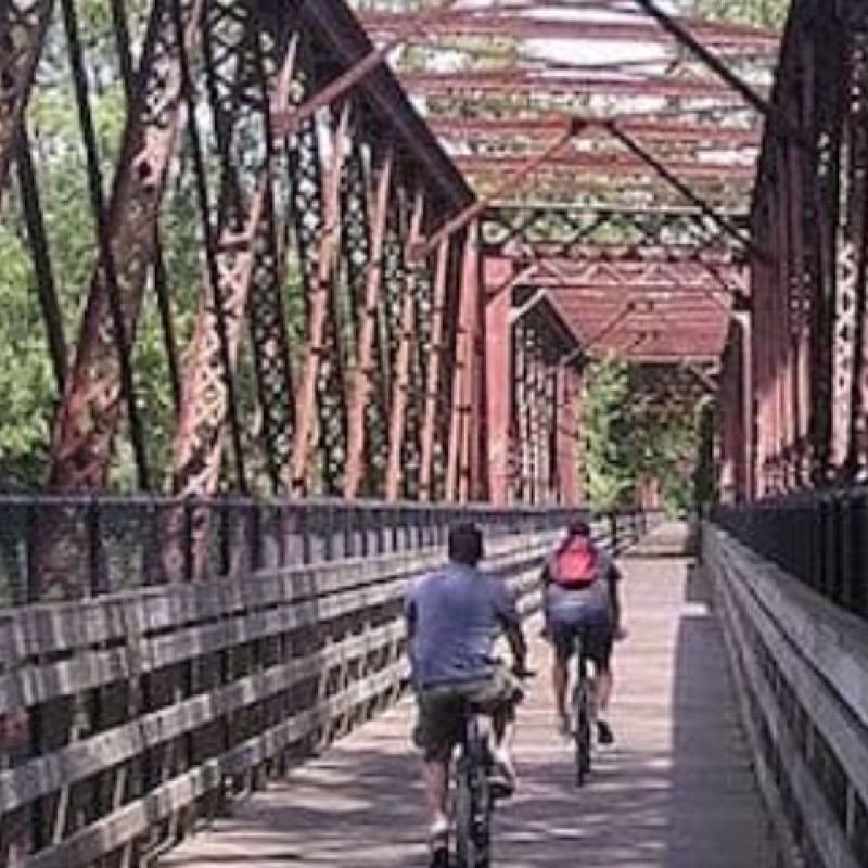 Bikers on a rail trail