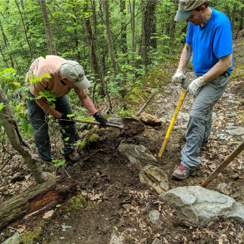 Volunteers repairing the A.T.