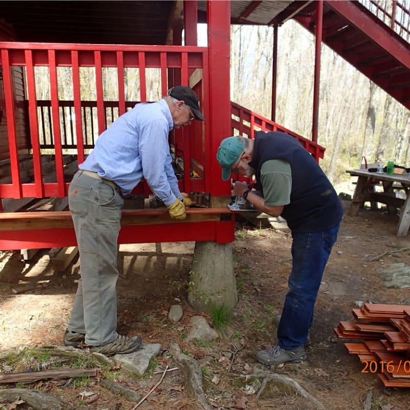 Volunteers maintaining Upper Goose Pond Cabin