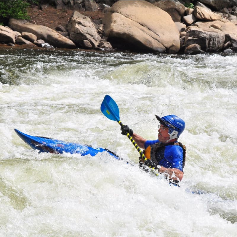 Kayaker in whitewater