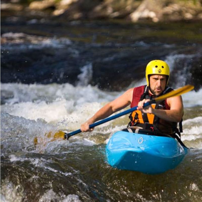 Kayaker in whitewater