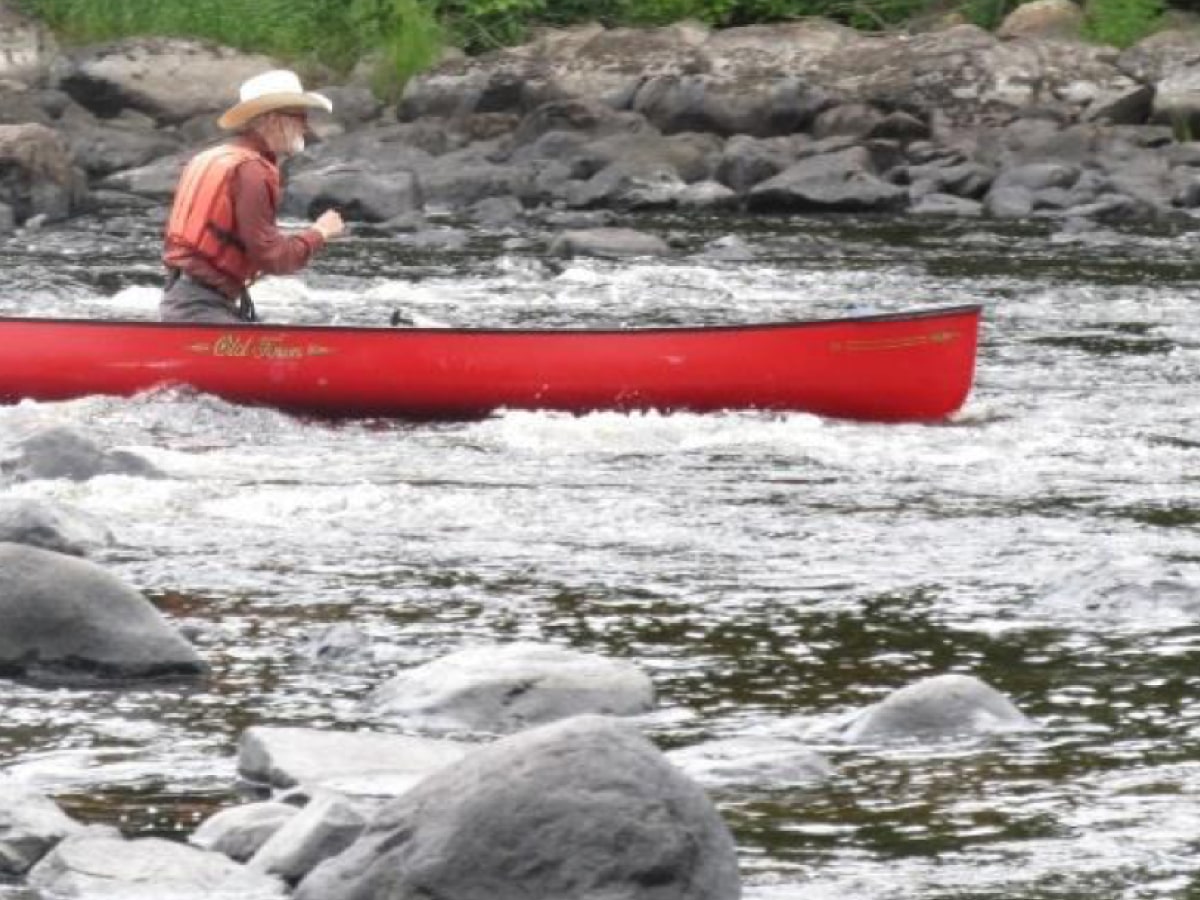 Back cover: David Miller running a rapid on the Spanish River