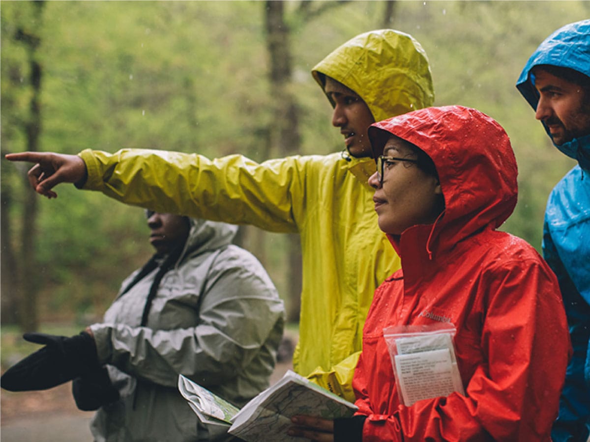 Hikers discuss trail route