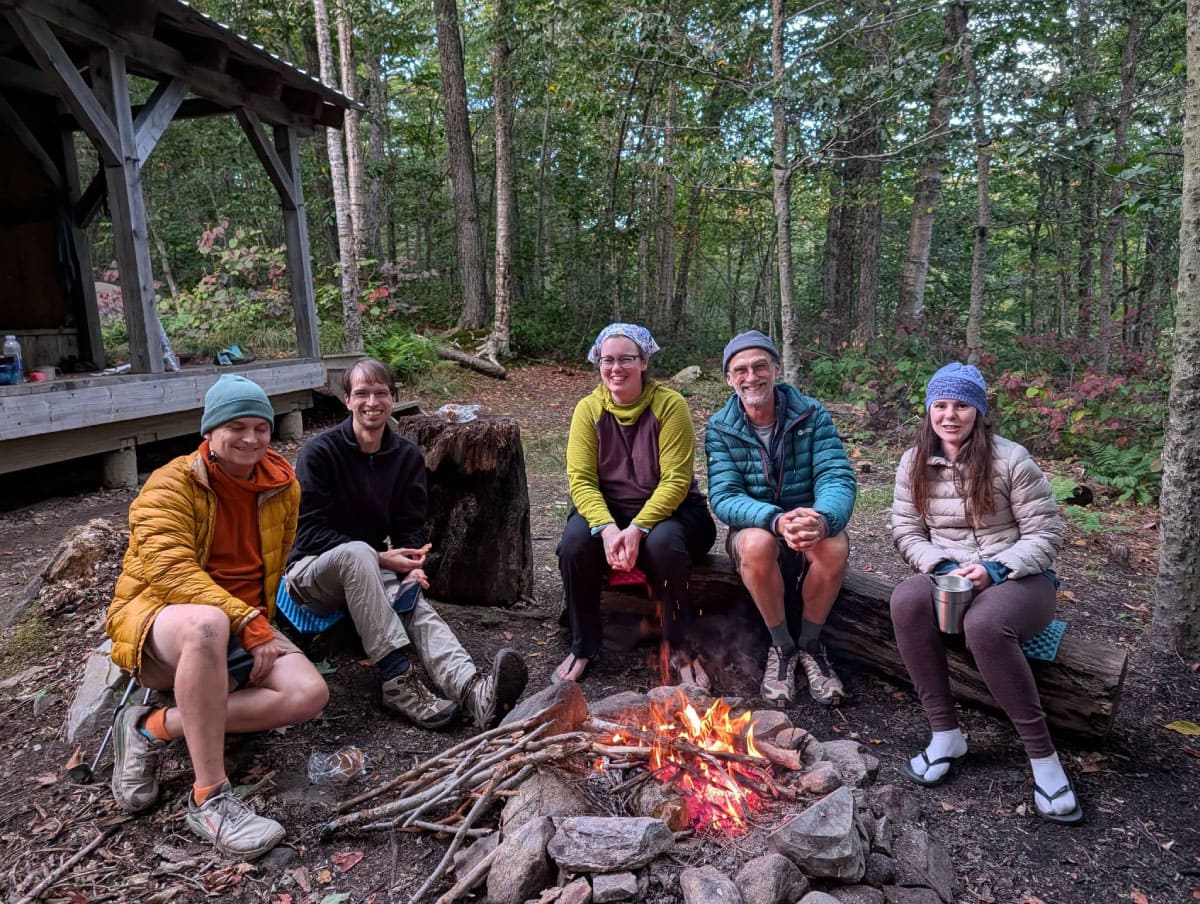 Hikers around a campfire