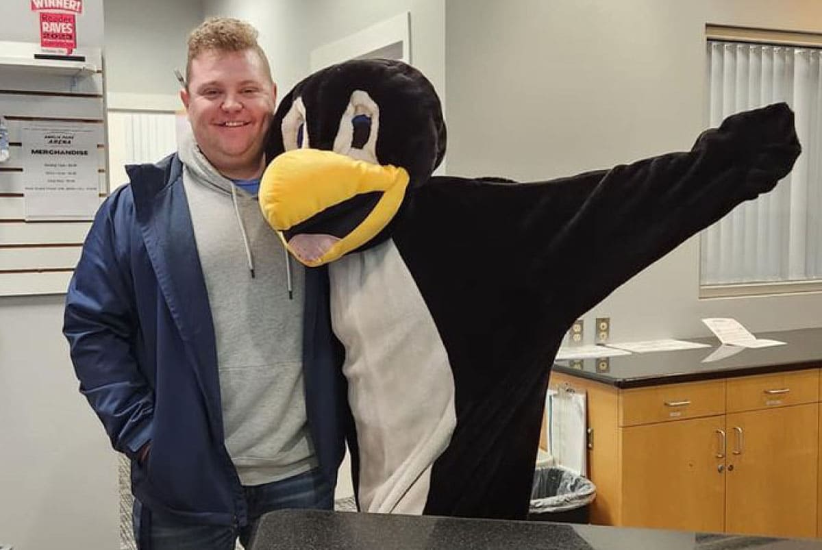 Skater and penguin mascot