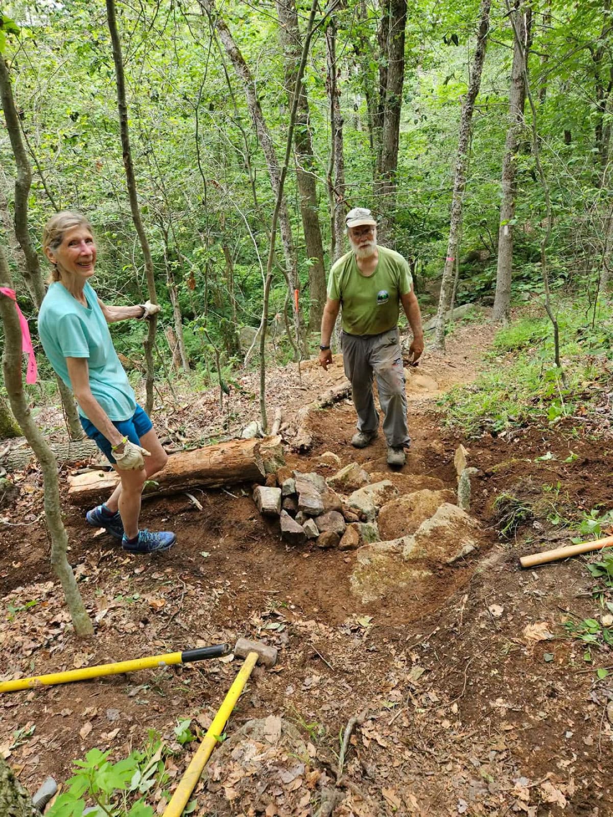 Workers maintaining a hiking trail