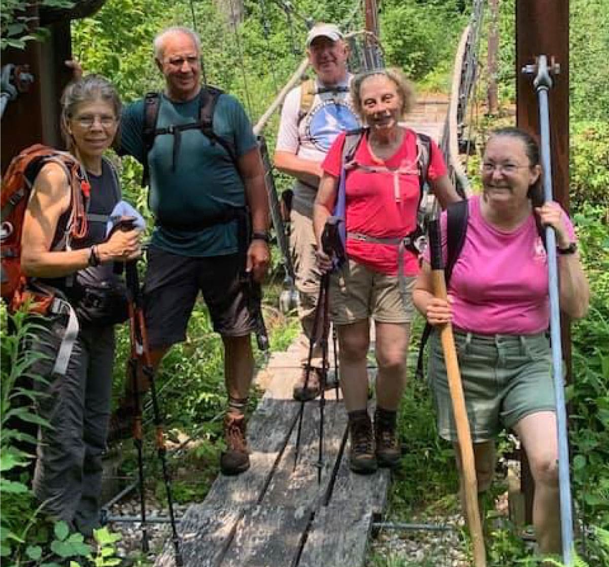 Hikers on a bridge