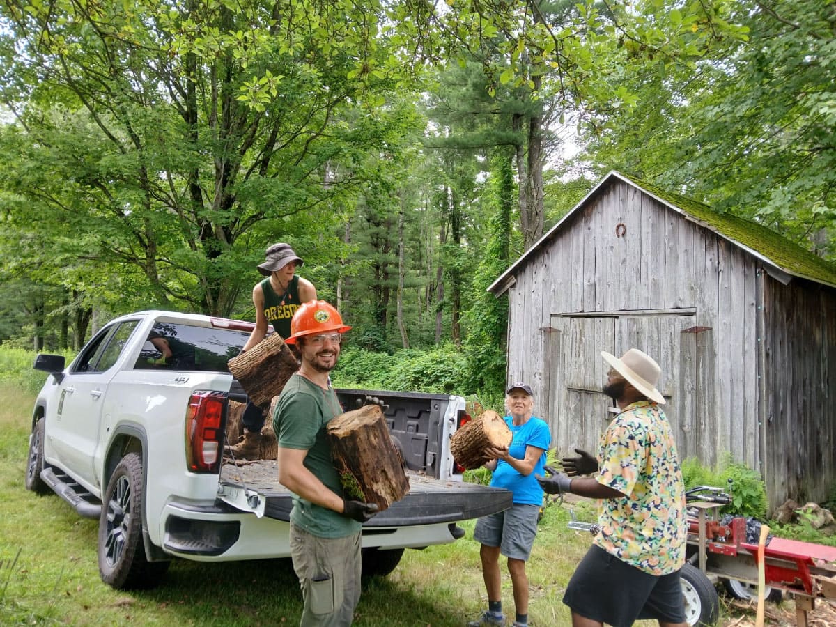 Unloading firewood from a truck