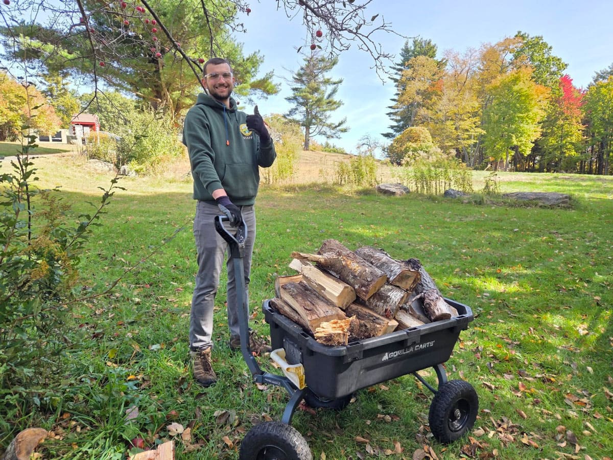 Worker cutting wood