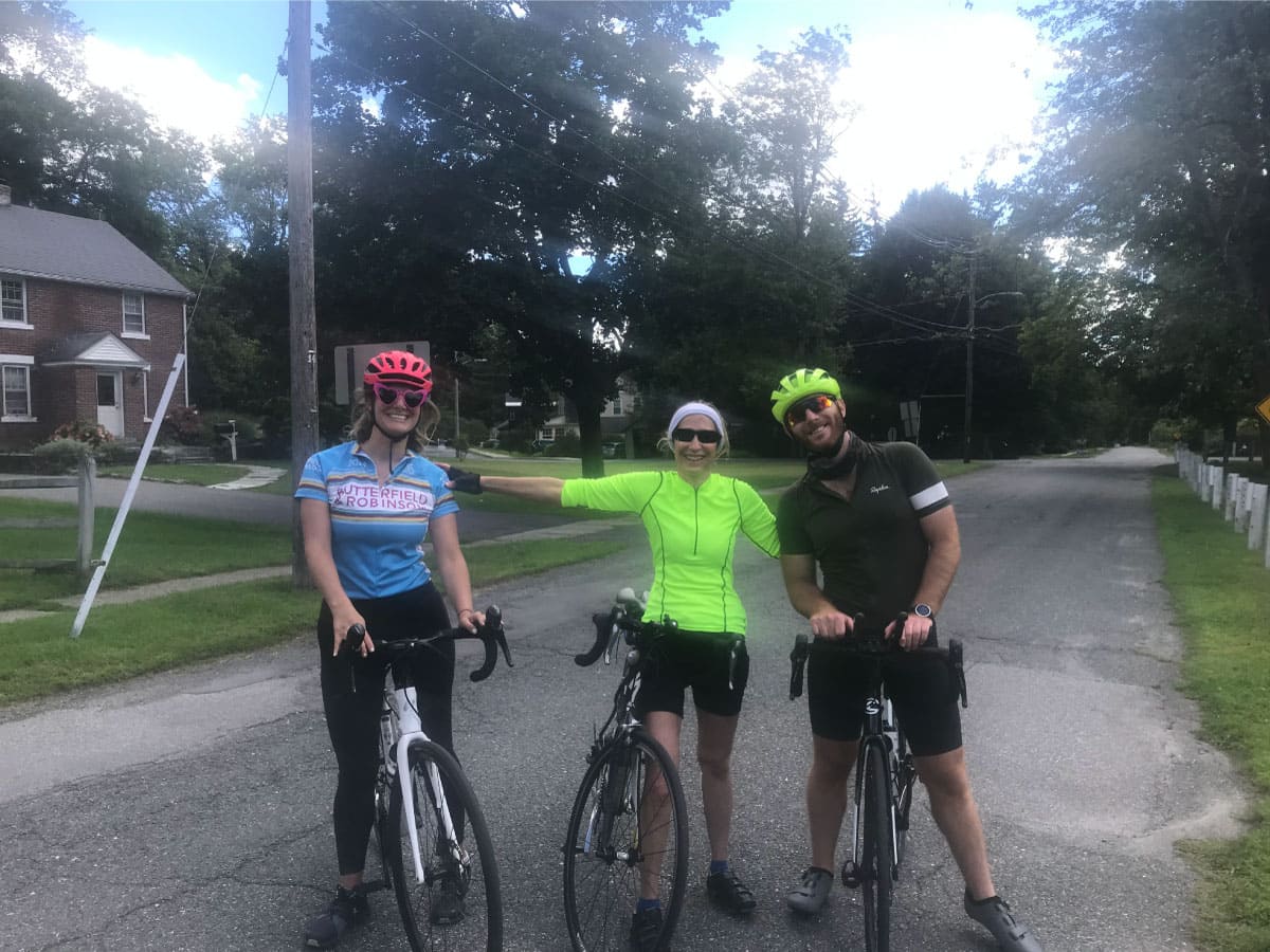 Cyclists pose for a photo