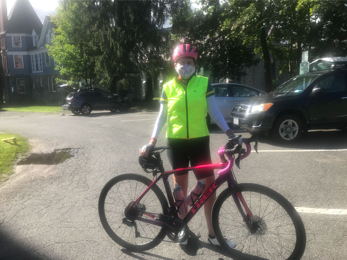A cyclist poses for a photo in Great Barrington