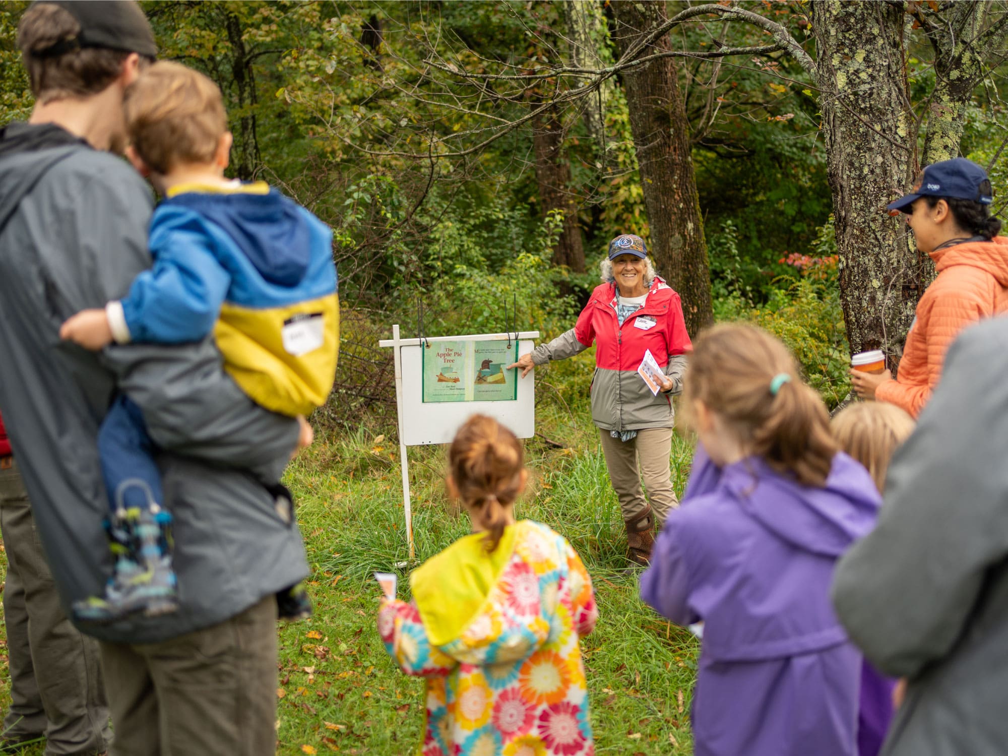 Laura Stennette and children on the StoryWalk®