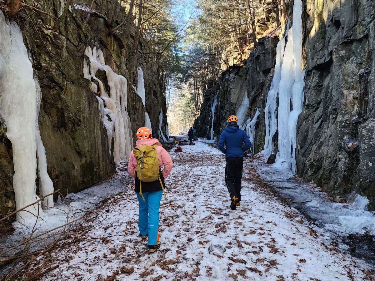 Climbers arrive at a railroad cut in Keene, NH