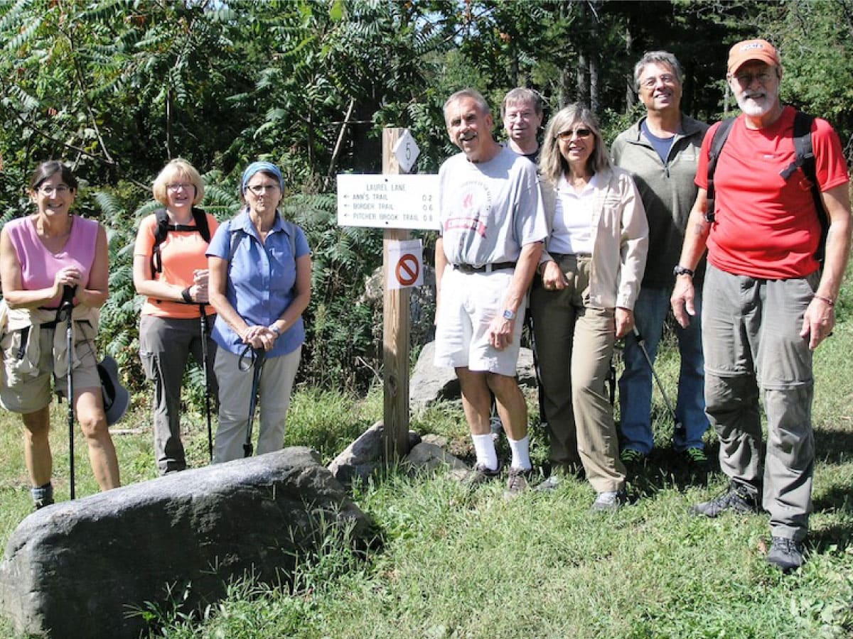 Hikers pose for a group photo