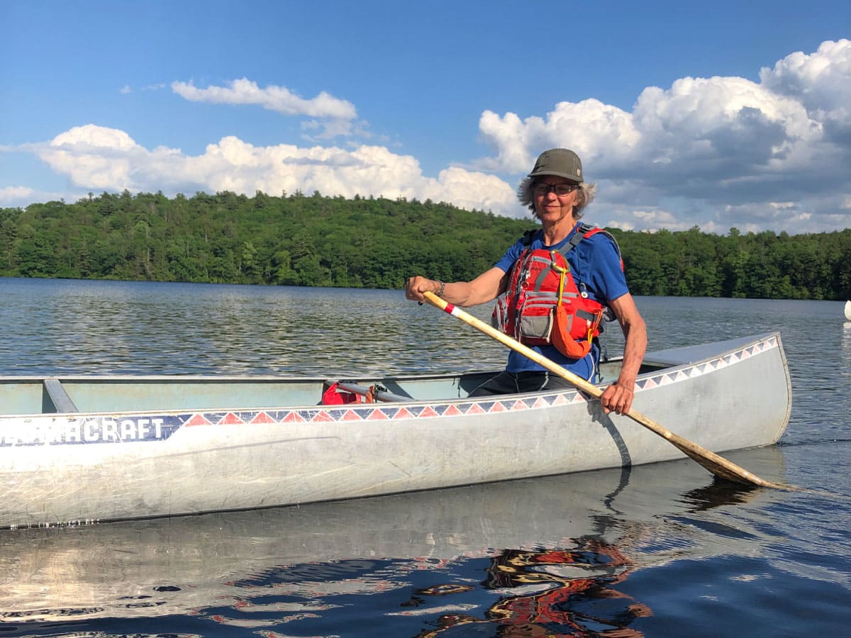 Woman canoeing on a lake