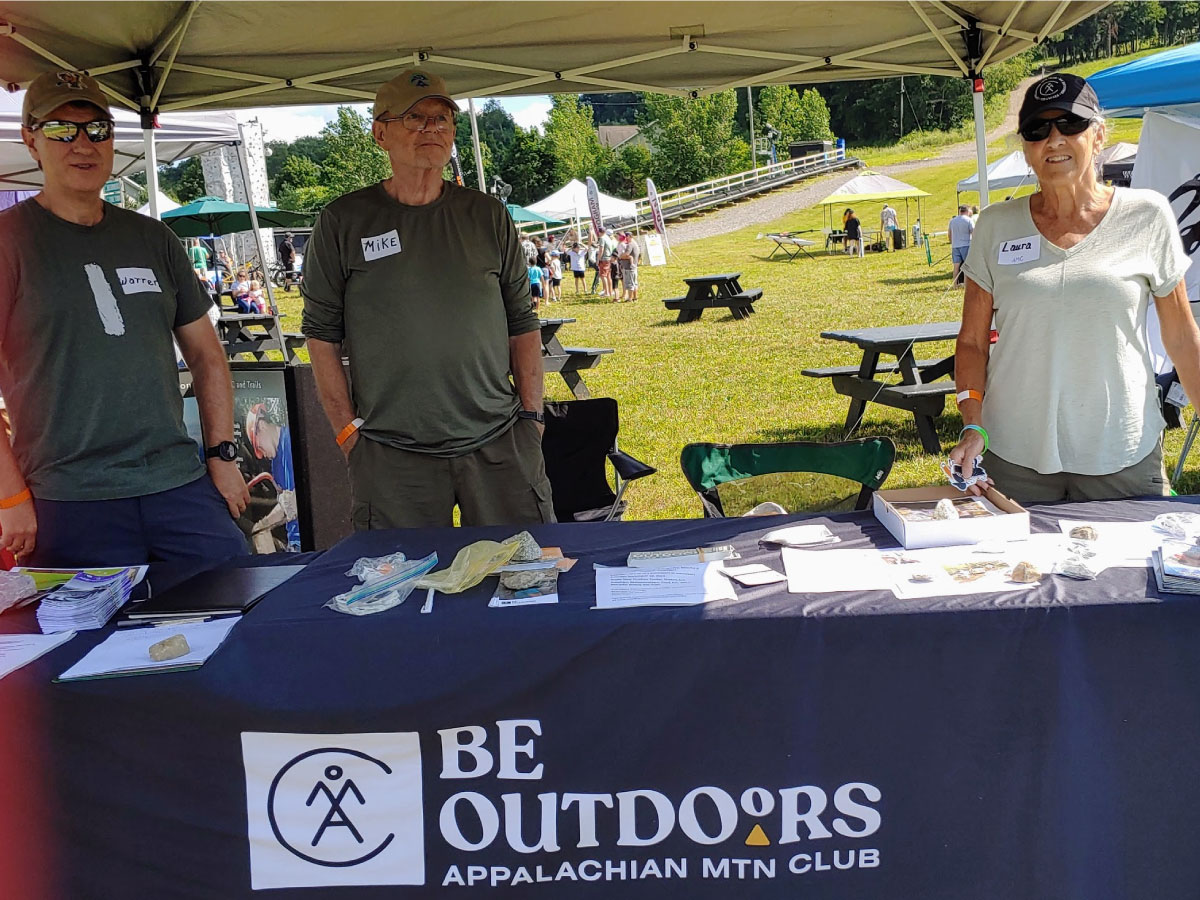 Members staffing the information table at Bousquet Mountain