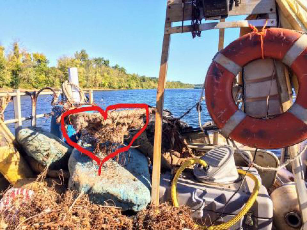 Fishing tackle on a boat with a hand-drawn heart