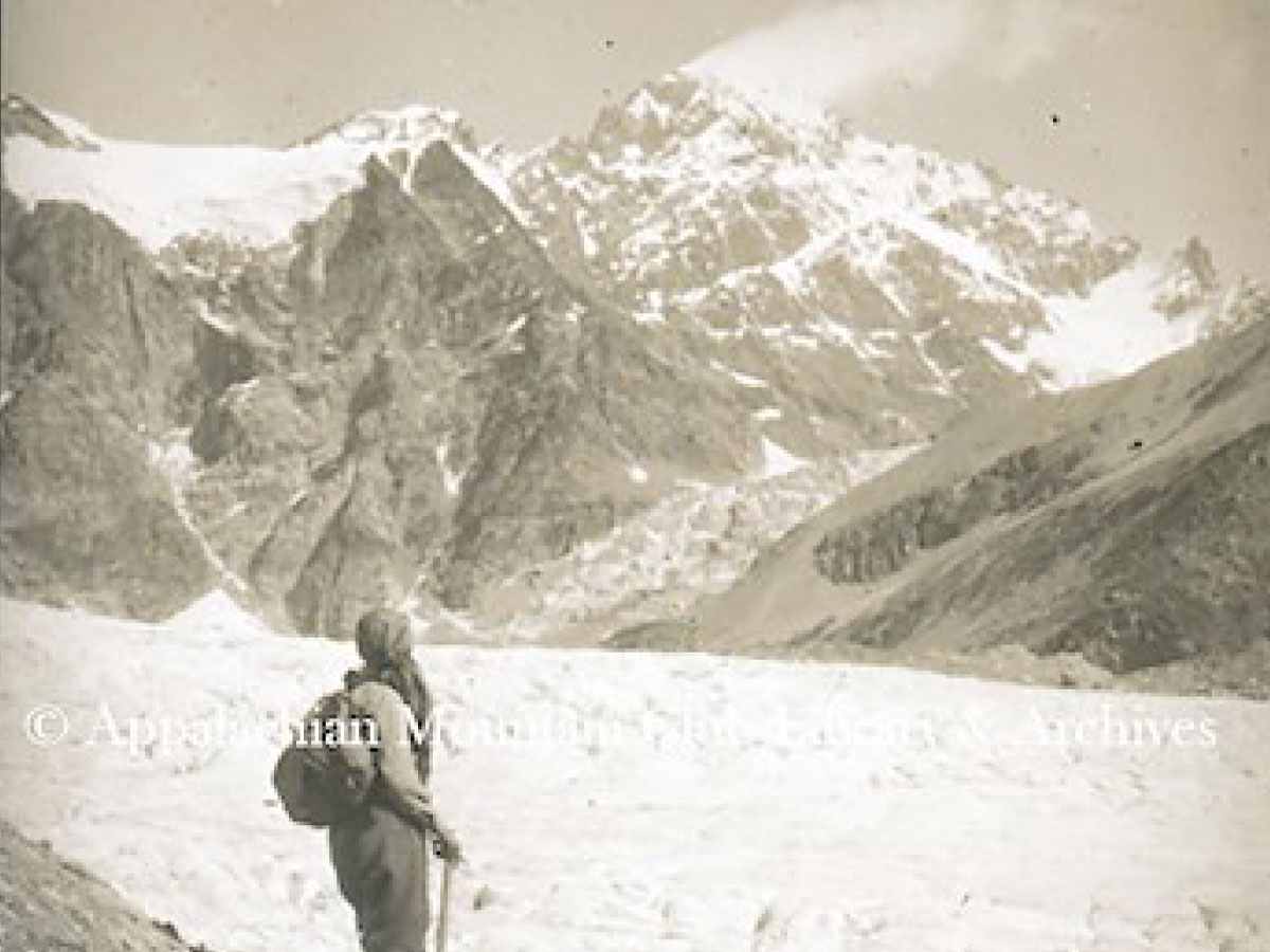 A female climber admires the view
