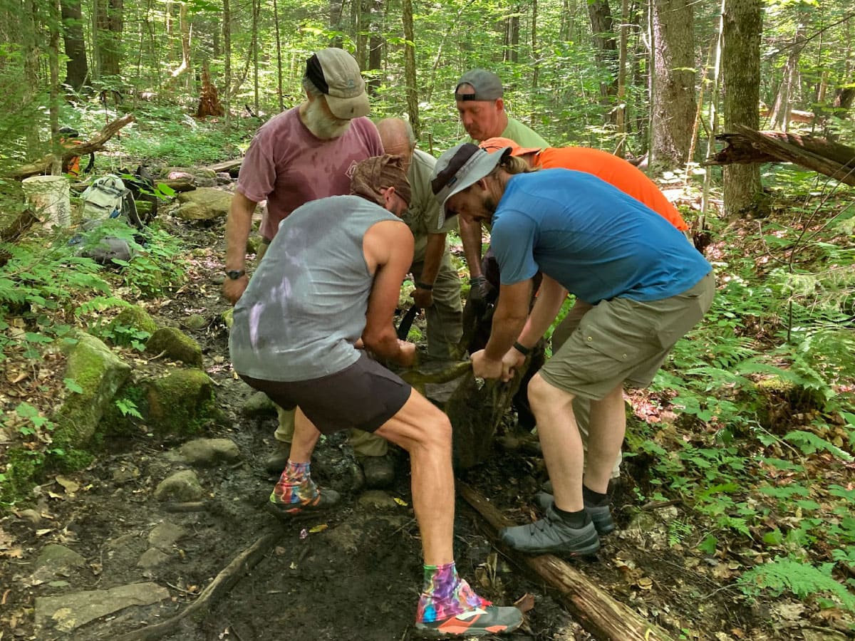 Members of the A.T. install stepstones on the A.T.